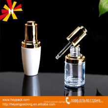 Botella de vidrio de cuentagotas de lujo 30ml con tapa de oro y color blanco spray